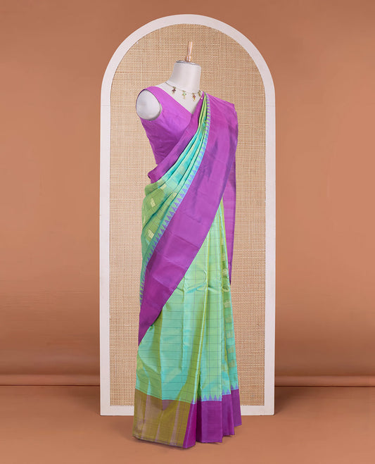 Green butta enclosed checked gadwal silk saree, contrast temple plain border & pallu steeped with horse & peacock buttas
