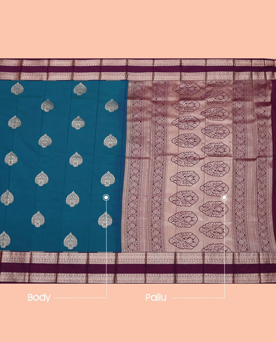Blue Budget Silk Saree, Decorated with Zari Buttas All Over Its Body, Complemented by a Contrast Traditional Zari Design Rettai Pettu Border, Intricate Pallu, and Paired with a Contrast Blouse