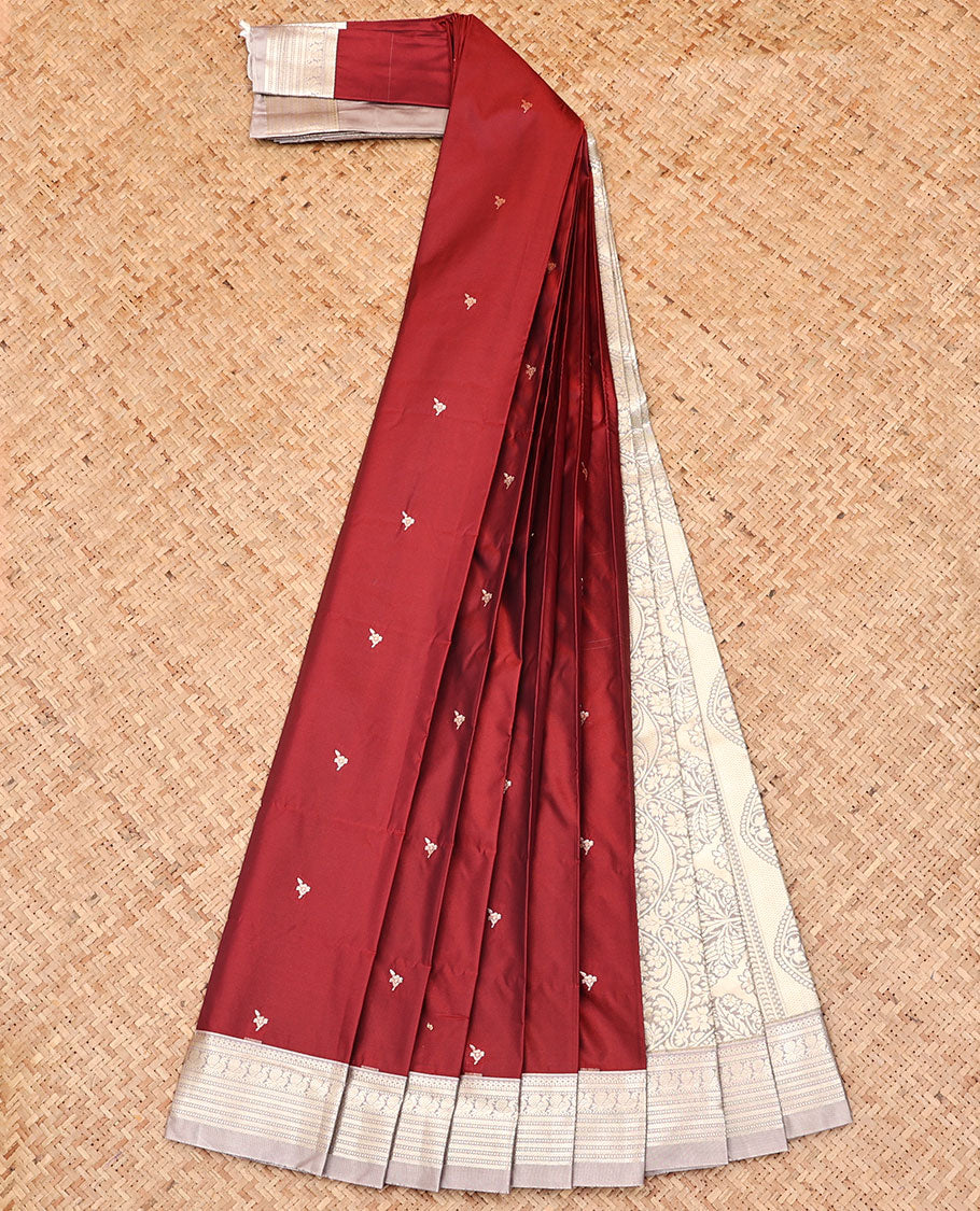 Maroon Budget Silk Saree, Gleamed Up with Zari Buttas, Captivating Contrast Traditional Zari Design Border, Pallu of Intricate Design, and Has a Contrast Blouse