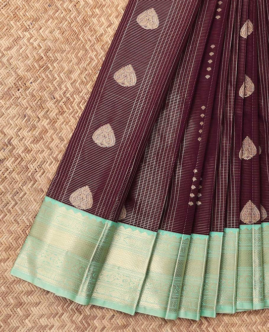 Brown Budget Silk Saree, Detailed with Zari Butta Enclosed Checks, a Contrast Traditional Zari Design Border, Grand Pallu, and a Contrast Blouse