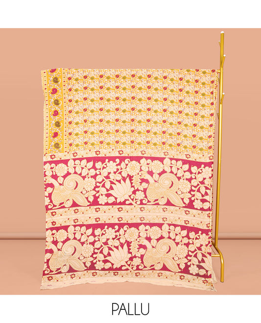Yellow Machine-Printed Kalamkari Cotton Saree, Decked Up with Batik Vines on Its Body, Highlighted by a Self-Border of Batik Paisley Print, Pallu of Floral-Peacock Print, and Paired with a Printed Blouse