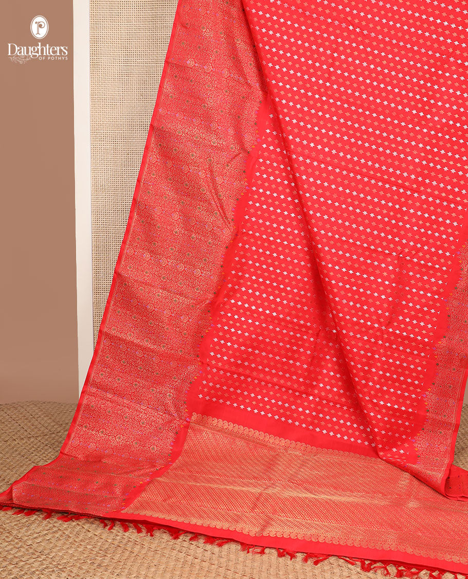 Red star motifs Kanchipuram silksaree, meenakari floral jaal design, zari border & diagonal leaf vine pallu