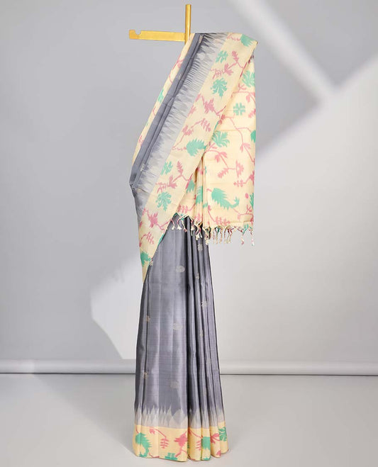 Grey floral buttas soft silk saree with contrast floral border & ikkat style floral design pallu