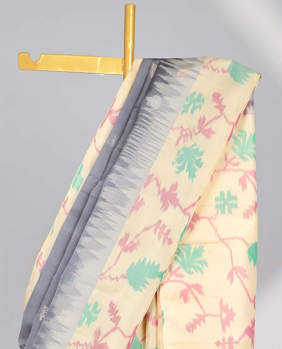 Grey floral buttas soft silk saree with contrast floral border & ikkat style floral design pallu