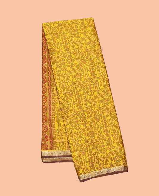 Yellow intricately printed semi-banaras printed saree, contrast zari border & intricate pallu 