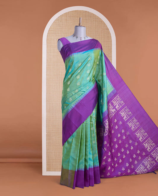 Green butta enclosed checked gadwal silk saree, contrast temple plain border & pallu steeped with horse & peacock buttas
