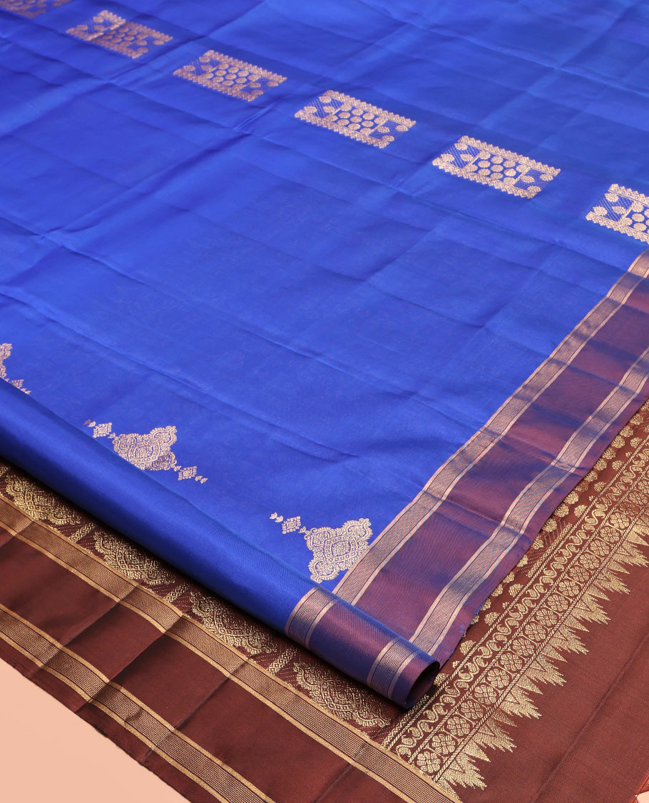 Blue Mayuri Lite Silk Mix Saree, Beautifully Bedecked with Zari Buttas All Over Its Body, Complemented by a Contrast Rettai Pettu Border, Pallu of Intricate Designs, and Paired with a Contrast Blouse