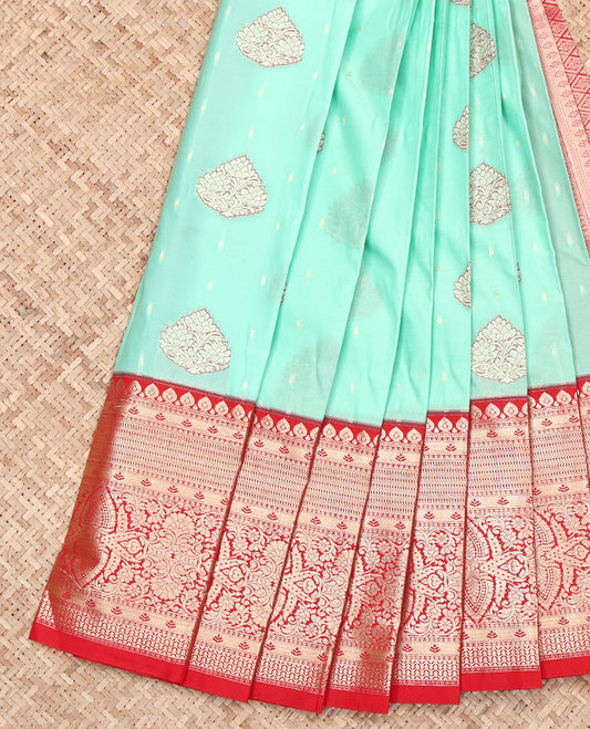 Turquoise Budget Silk Saree, Enlivened with Zari Buttas on Its Body, Complemented by a Contrast Traditional Zari Design Border, Grand Jaal Pallu, and Paired with a Contrast Blouse