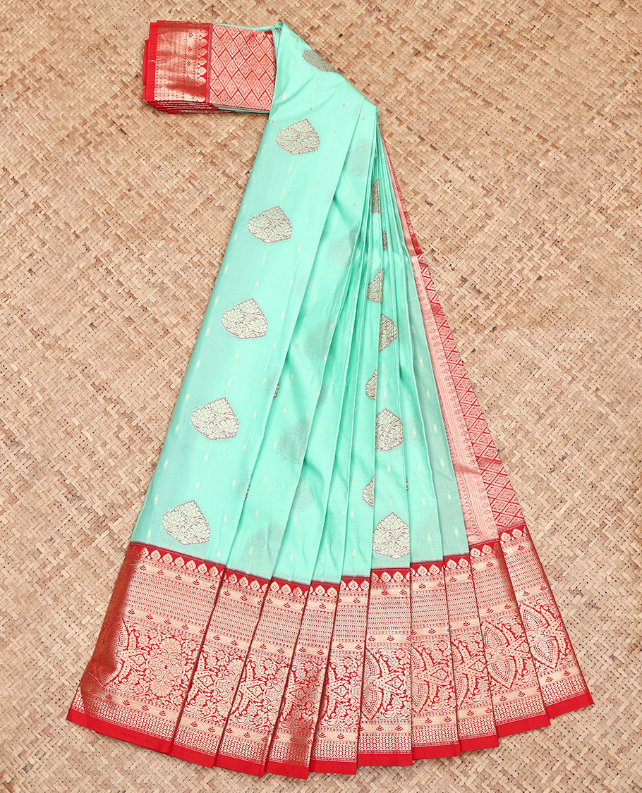 Turquoise Budget Silk Saree, Enlivened with Zari Buttas on Its Body, Complemented by a Contrast Traditional Zari Design Border, Grand Jaal Pallu, and Paired with a Contrast Blouse