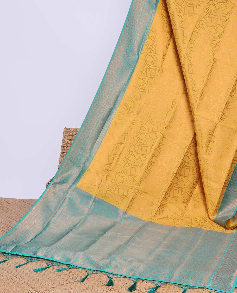 Peach geometric design butter silk saree with contrast zari border & intricate zari pallu