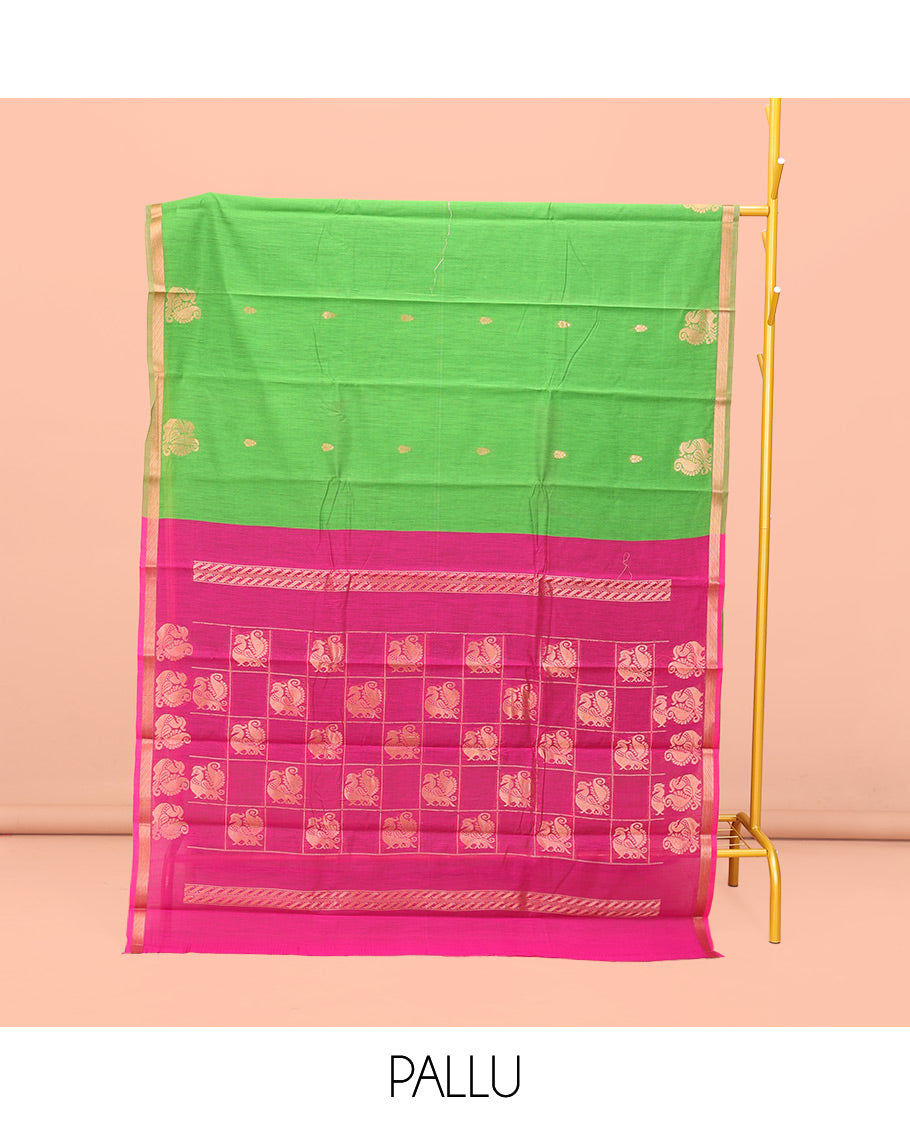Parrot Green Semi-Silk Cotton Saree, Mesmerized with Buttas and Peacock Buttas All Over Its Body, a Subtle Zari Piping Border, Pallu of Peacock Butta Enclosed Checked Design, and Paired with a Contrast Blouse