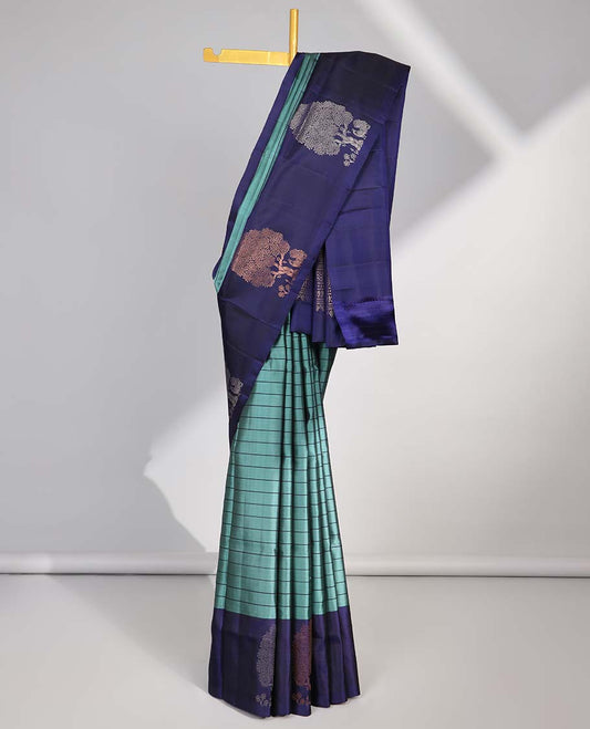 Blue striped soft silk saree with contrast tree buttas border & floral zari design pallu