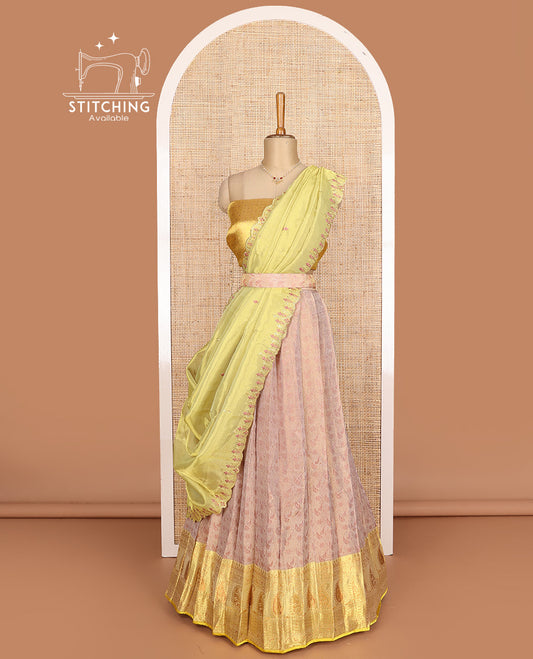 Peach art silk half-saree, sparsely design with contrast traditional motifs bordered skirt, contrast blouse, and scallop embroidered dhavani