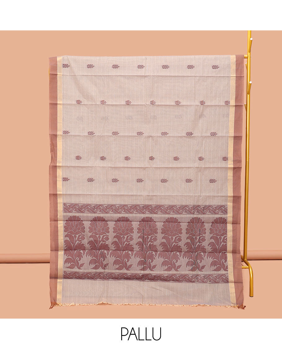 Chikku Kanchi Cotton Saree, Subtly Sparkled with Buttas, Complemented by a Contrast Border, Floral Pallu, and a Matching Blouse