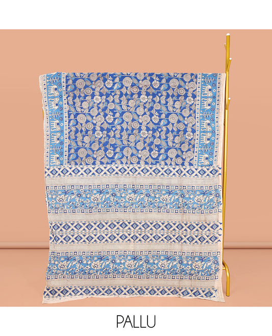 Blue Machine-Printed Kalamkari Cotton Saree, Showcasing Floral Designs on Its Body, Complemented by a Contrast Border of Elephant Print, Pallu of Floral-Geometric Print, and Paired with a Printed Blouse