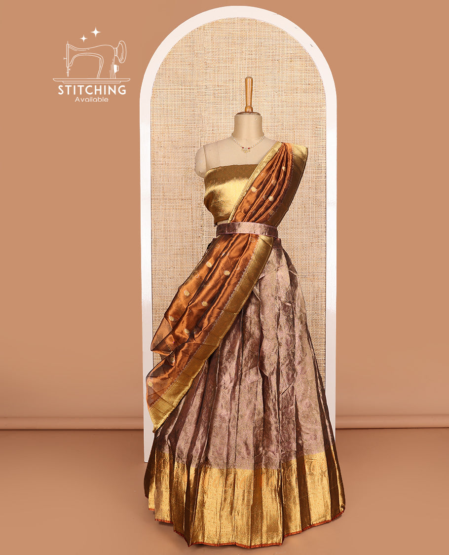 Brown art silk half-saree, sparsely design with contrast traditional motifs bordered skirt, contrast blouse, and traditional motif dhavani