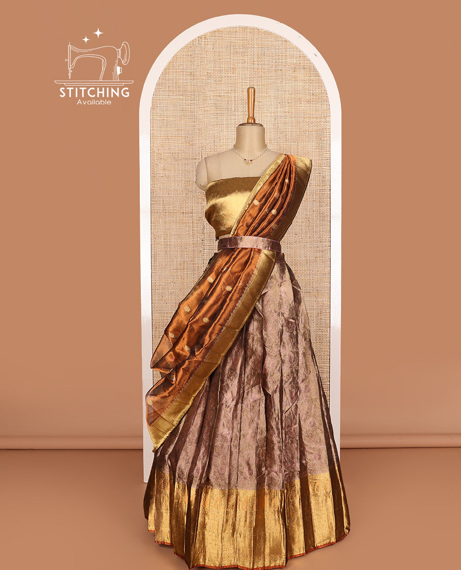 Brown art silk half-saree, sparsely design with contrast traditional motifs bordered skirt, contrast blouse, and traditional motif dhavani