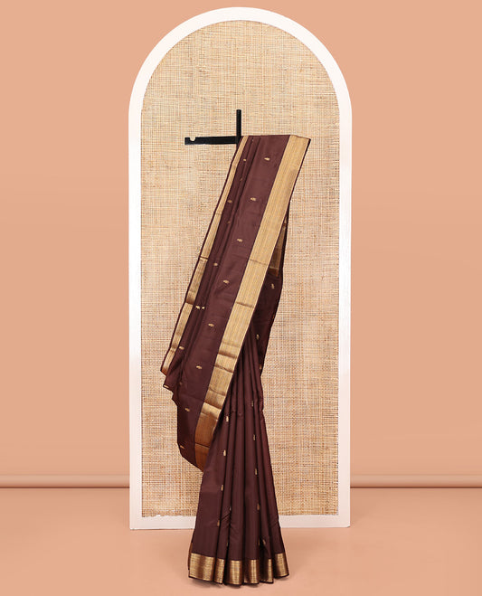 Brown Vasundhara Lite Silk Mix Saree, Embellished with Zari Buttas All Over Its Body, Highlighted by Zari Border of Geometric Patterns, Intricately Designed Pallu, and Paired with a Matching Blouse