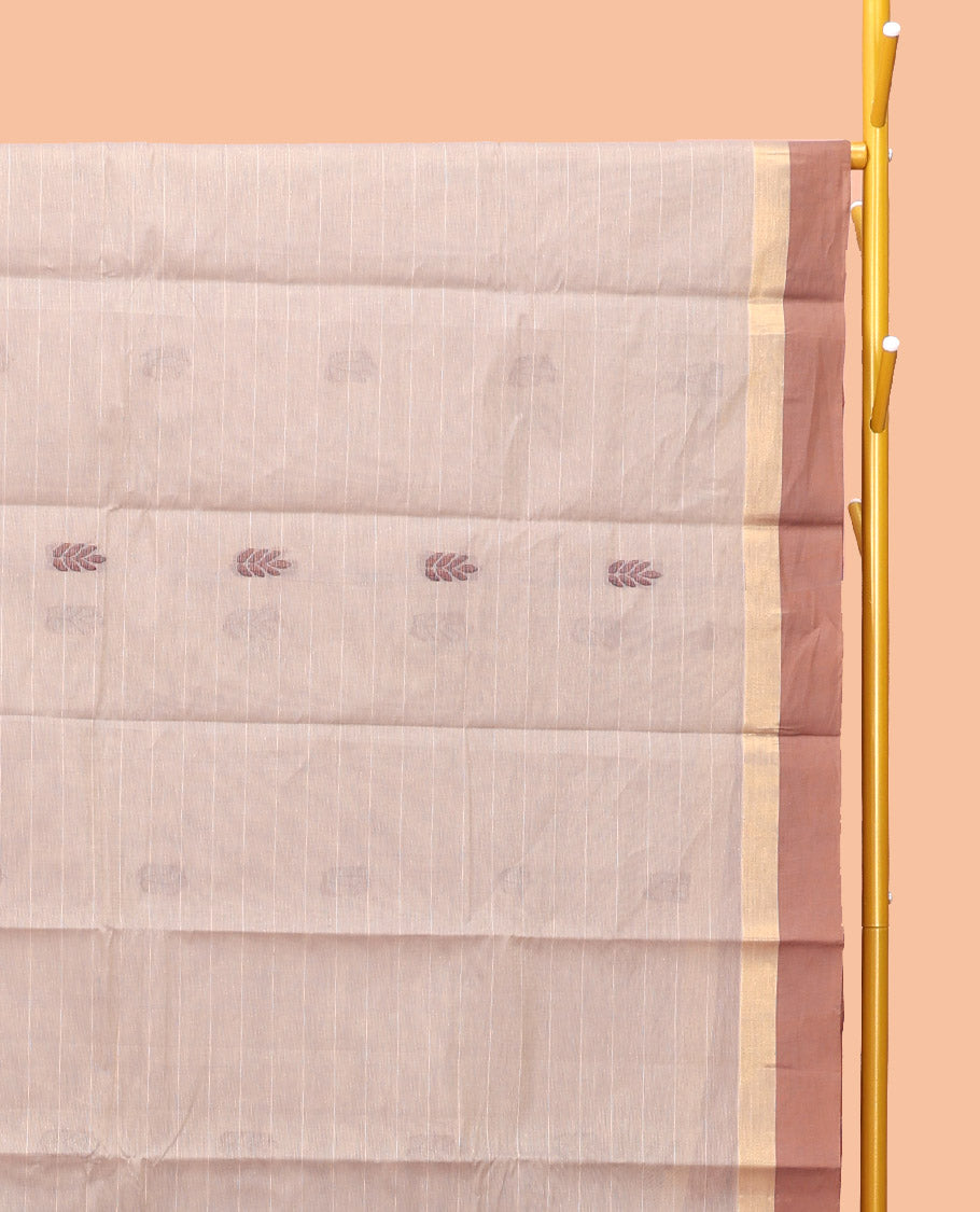 Chikku Kanchi Cotton Saree, Subtly Sparkled with Buttas, Complemented by a Contrast Border, Floral Pallu, and a Matching Blouse