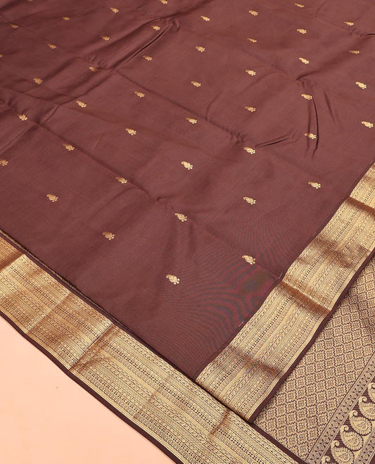Brown Vasundhara Lite Silk Mix Saree, Embellished with Zari Buttas All Over Its Body, Highlighted by Zari Border of Geometric Patterns, Intricately Designed Pallu, and Paired with a Matching Blouse