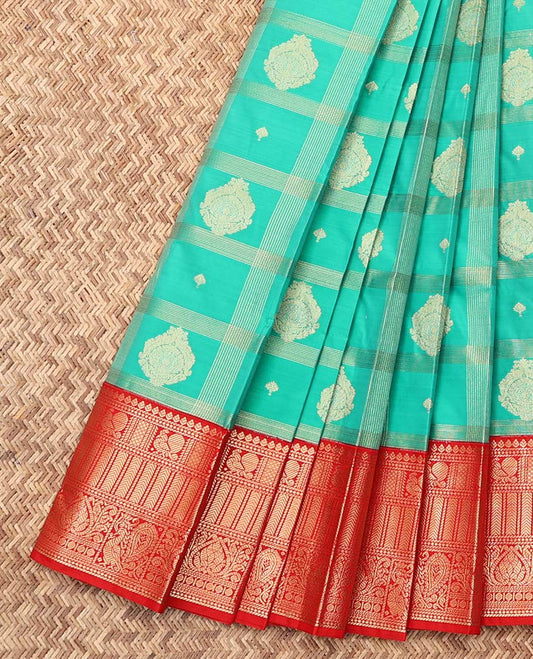 Turquoise Budget Silk Saree, Gleamed Up with Zari Buttas and Checks, a Contrast Traditional Zari Design Border, Grand Pallu, and a Contrast Blouse