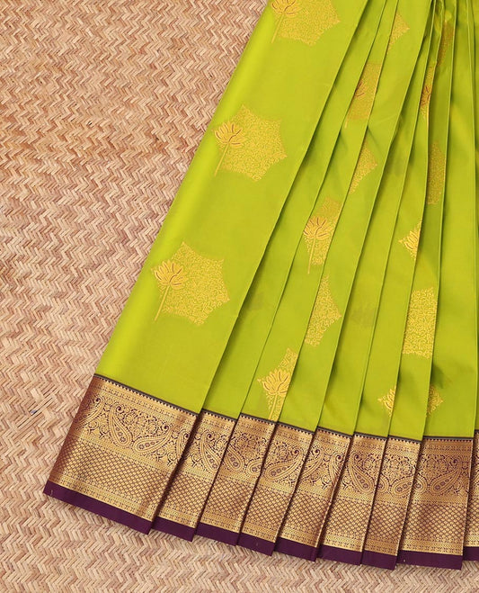 Green Budget Silk Saree, Enlivened with Zari Buttas, Complemented by Contrast Traditional Zari Border, a Grand Pallu and a Contrast Blouse