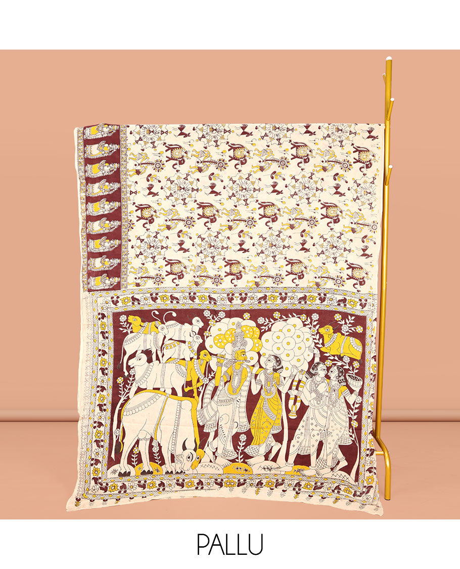 Cream Machine-Printed Kalamkari Cotton Saree, Artfully Printed with Warli-Motifs on Its Body, Complemented by a Contrast Human Motifs Printed Border, Pallu of Lord Radha Krishnan Print, and Paired with a Printed Blouse