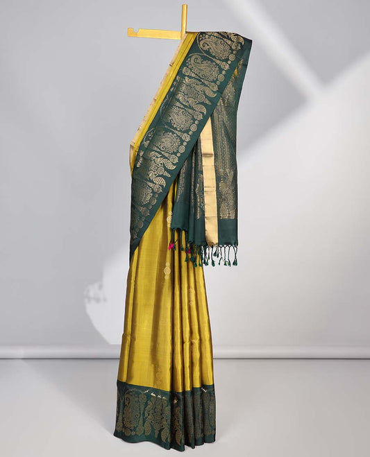 Green small buttas soft silk saree with contrast zari design border & intricate zari design pallu