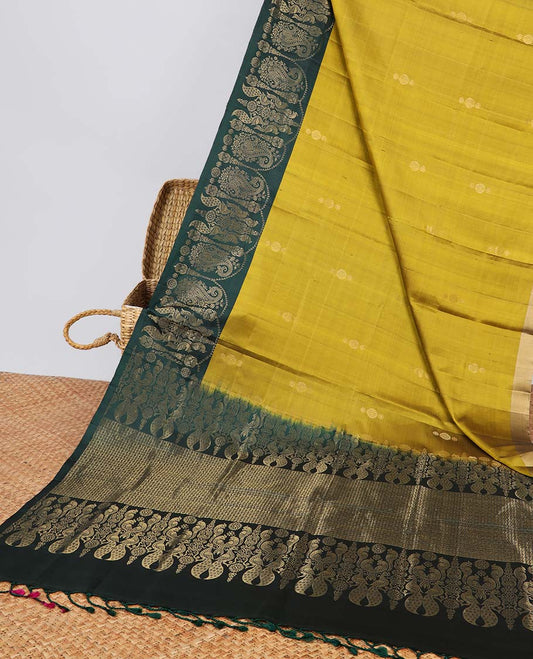 Green small buttas soft silk saree with contrast zari design border & intricate zari design pallu