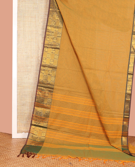 Mustrad Plain Chettinad Cotton Saree, Complemented by Contrast Zari Border of Traditional Designs, Subtly Striped Pallu, and Paired with a Matching Blouse