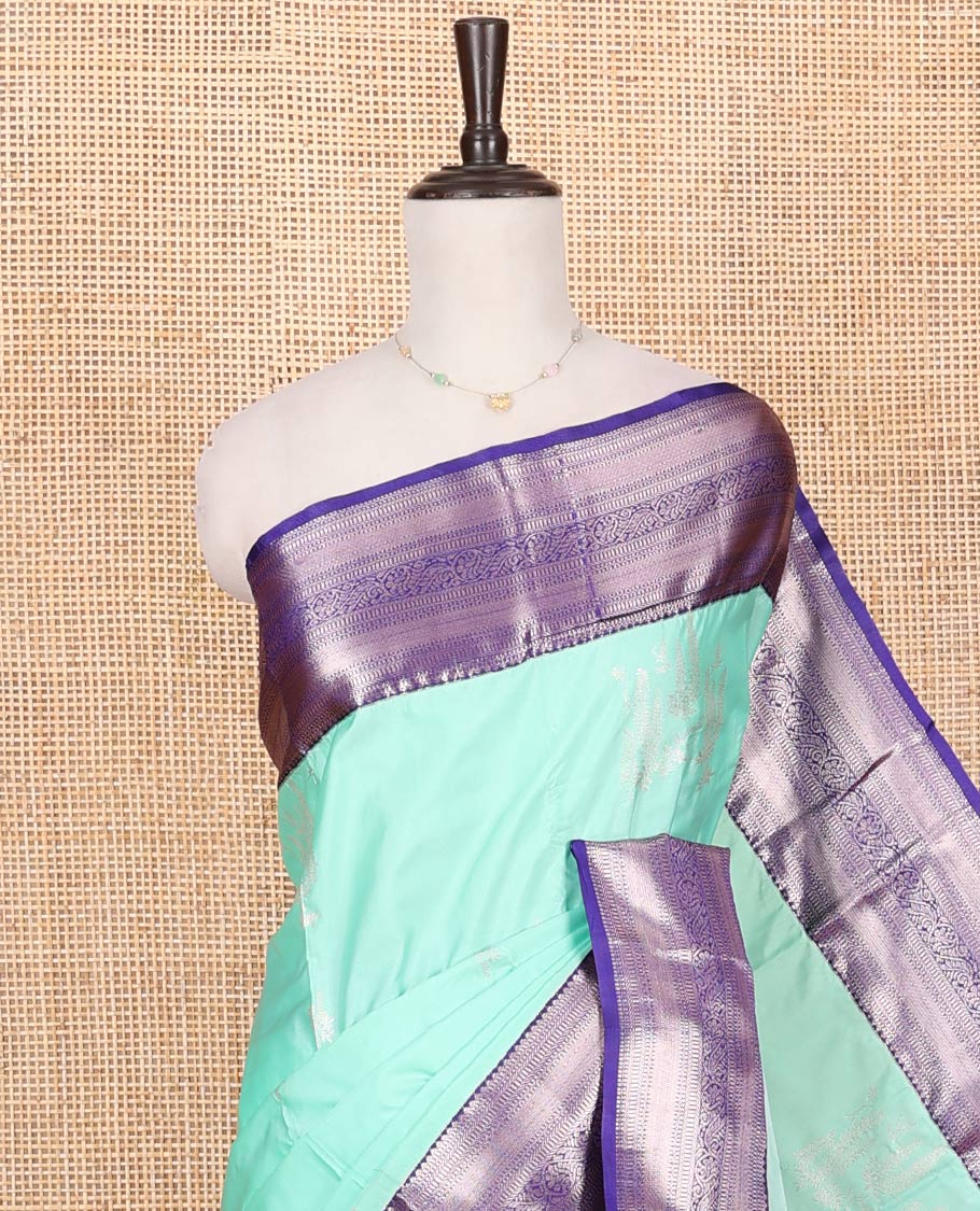 Turquoise Budget Silk Saree, Enthralled with Zari Buttas on Its Body, Complemented by a Contrast Traditional Zari Design Border, Chevron Striped Pallu, and Paired with a Contrast Blouse