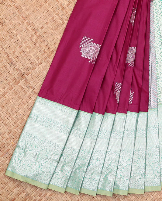 Light Maroon Budget Silk Saree, Bedecked with Buttas All Over Its Body, Complemented by a Contrast Traditional Zari Design Border, Pallu of Intricate Designs, and Paired with a Contrast Blouse