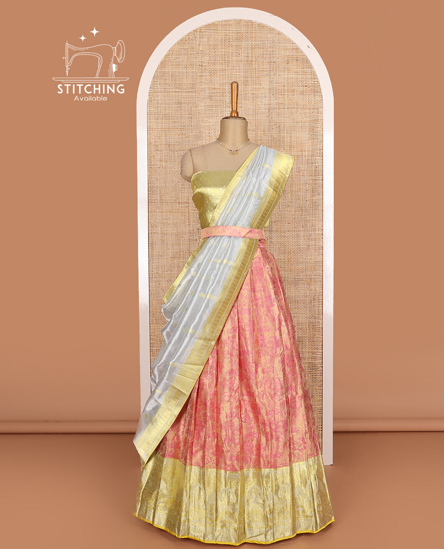Pink art silk half-saree, floral vine design with contrast traditional zari bordered skirt, contrast jacquard blouse, and traditional motif dhavani