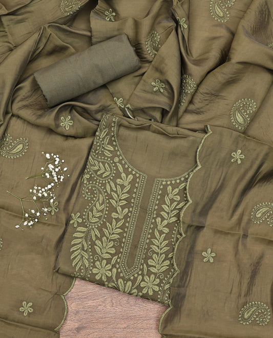 Green Material Chudidar Set, Delicately Woven with Floral-Paisley Embroidered Muslin Top, a Plain Santoon Bottom, and Paired with Intricately Printed Muslin Dupatta