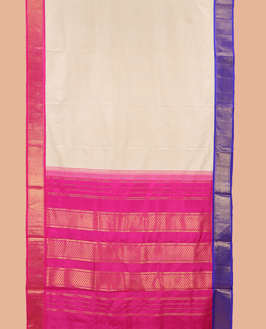 Light cream plain nine-yard silk saree, contrast pink-blue Ganga Jamuna korvai border & pallu of traditional ara maadam designs