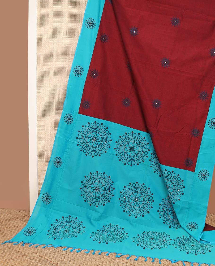 Red sun brust motifs printed with mirror embroidered poly cotton saree, contrast chakra print with mirror work border, and pallu of chakram print, and mirrorwork