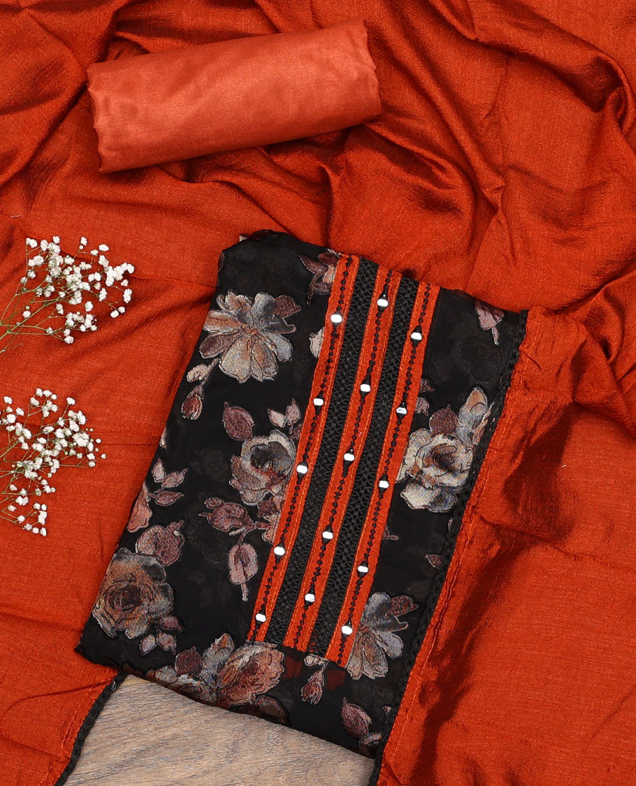 Black material chudidar set, floral print with mirror neck embroidered top, contrast orange bottom and plain dupatta