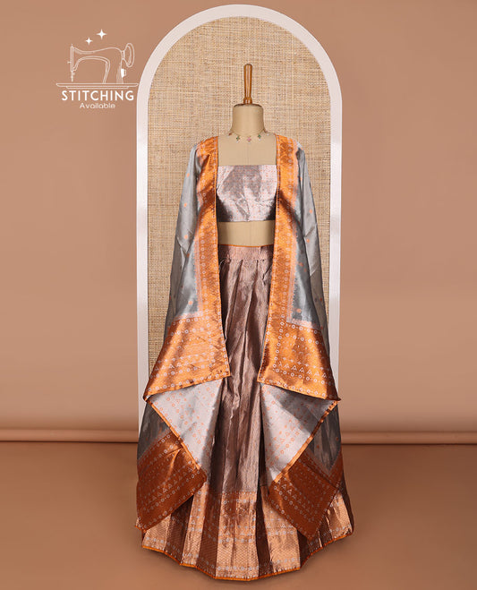 Brown tissue half saree with  contrast intricate zari design border, zari design blouse & floral design dhavani
