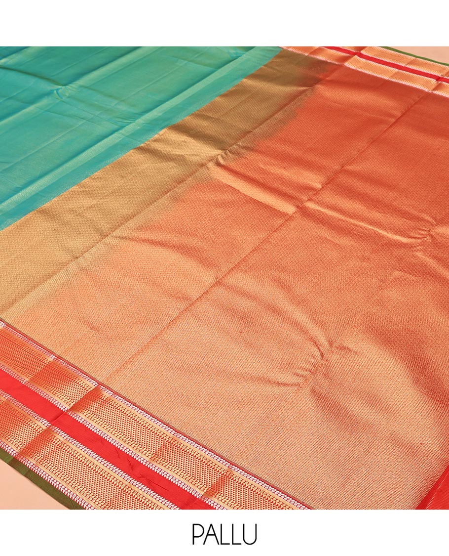 Green Vasundhara Lite Silk Saree, Gleamed up with Zari Vaira Oosi Stripes All Over Its Body, Complemented by Contrast Rettai Pettu Border of Ara Maadam Designs, Grand Pallu and Paired with a Contrast Blouse