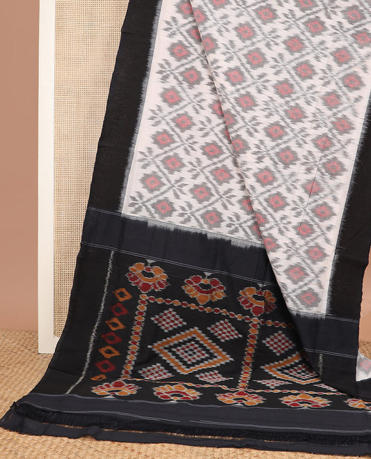 Half-white geometric design Pochampally ikkat saree, contrast plain black border, and ikkat design pallu