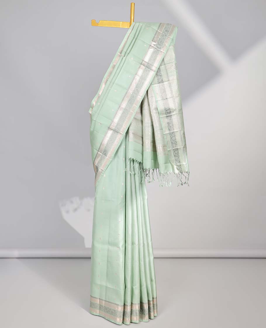 Green small buttas soft silk saree with saelf zari border & intricate zari design pallu