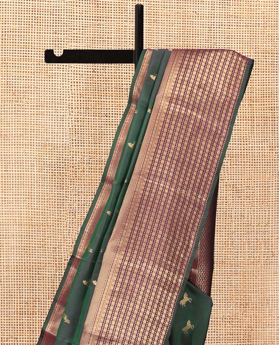Green Vasundhara Lite Silk Saree, Enriched with Zari Buttas All Over Its Body, Complemented by Contrast Border of Rekku, Poun, Ara Maadam, and Geometric Patterns, Grand Pallu and Paired with a Contrast Blouse