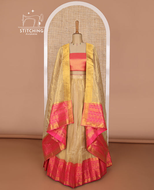 Lemon yellow tissue half saree with contrast geometric design border, zari design blouse & intricate zari design dhavani