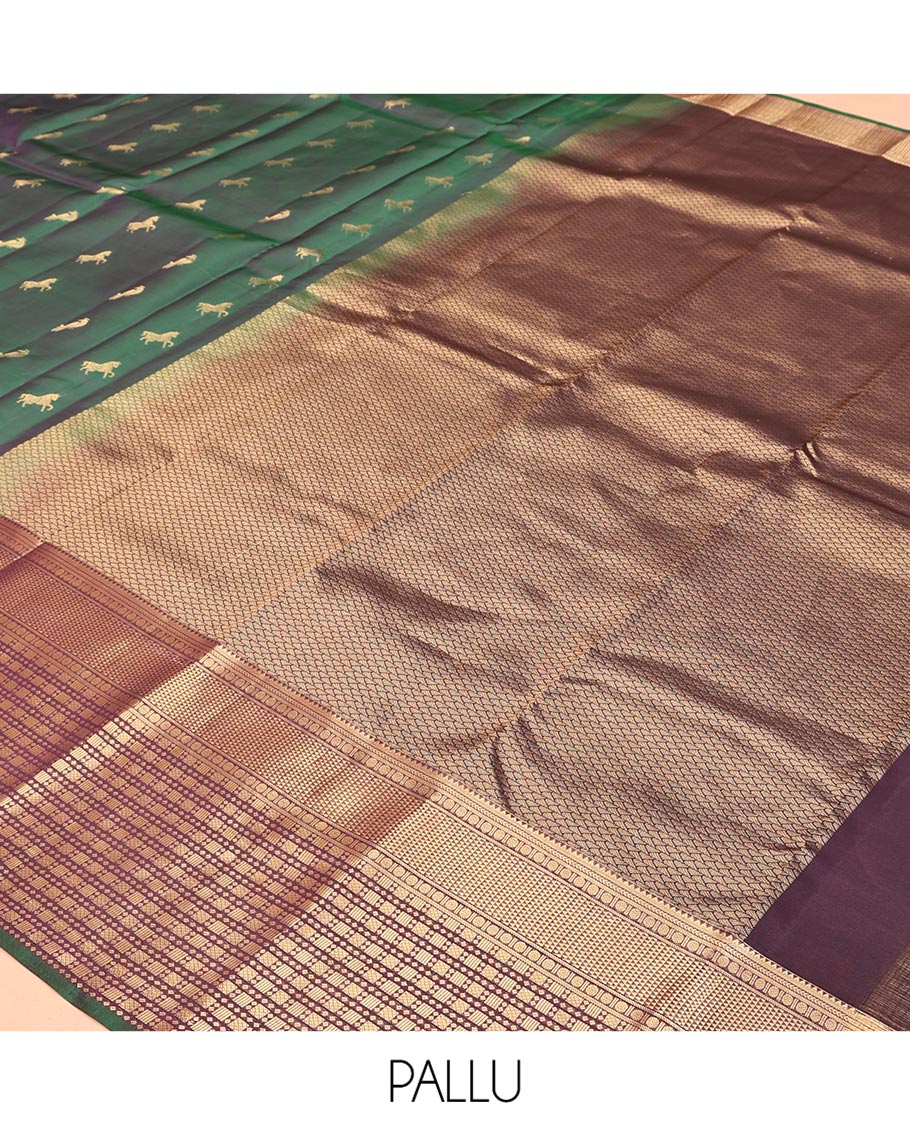 Green Vasundhara Lite Silk Saree, Enriched with Zari Buttas All Over Its Body, Complemented by Contrast Border of Rekku, Poun, Ara Maadam, and Geometric Patterns, Grand Pallu and Paired with a Contrast Blouse