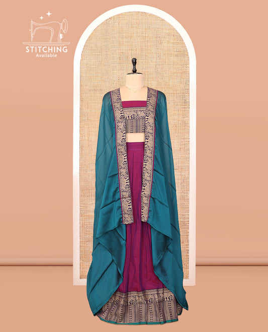 Purple Cotton Half-Saree Features Plain Skirt, a Contrast Traditional Thread Border, a Matching Blouse, and a Contrast Dhavani