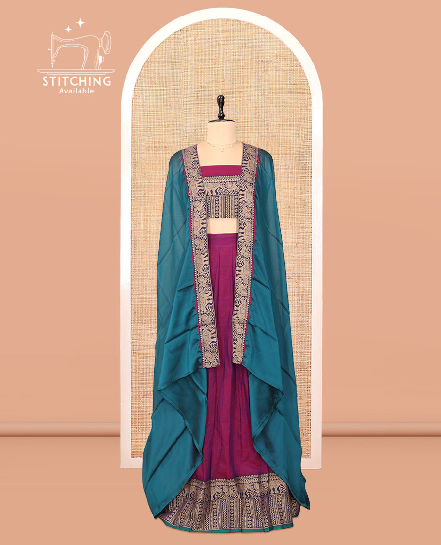 Purple Cotton Half-Saree Features Plain Skirt, a Contrast Traditional Thread Border, a Matching Blouse, and a Contrast Dhavani
