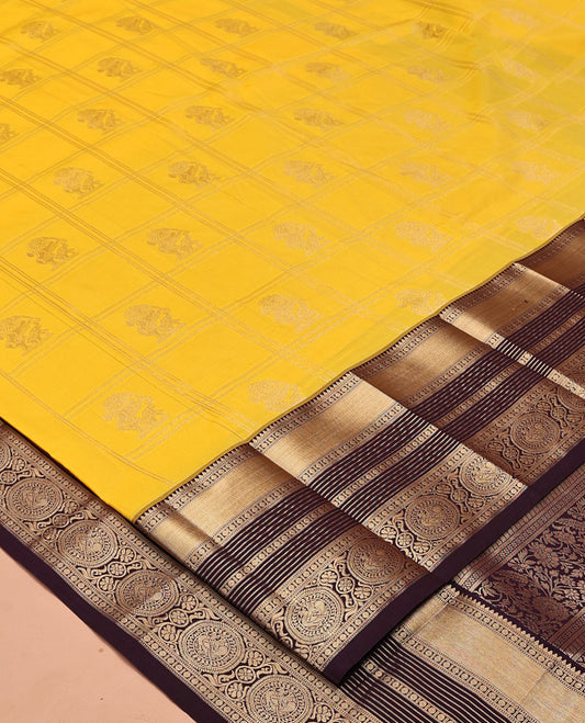 Lemon Yellow-Coffee Brown Budget Silk Saree, Subtly Sparkled With Zari Butta Enclosed Checks On Its Body, Complemented by Contrast Traditional Zari Designs Woven Border of Chakram Design, Jaal Pallu and Paired with a Contrast Blouse