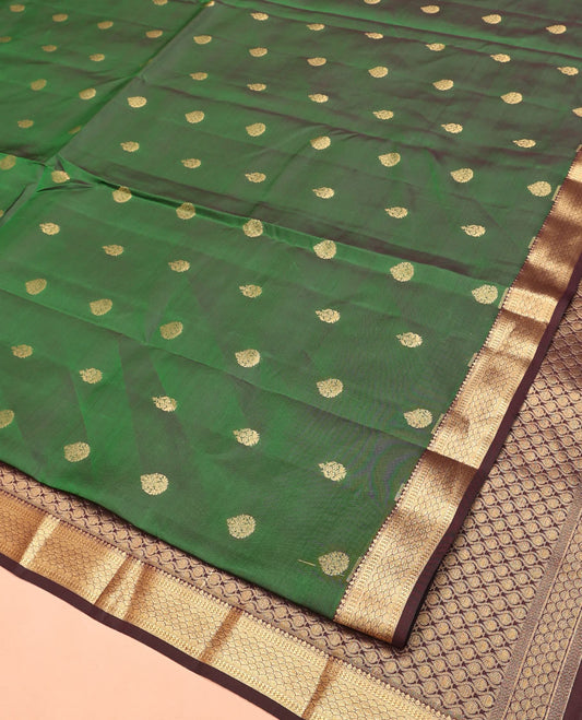 Green Vasundhara Lite Silk Mix Saree, Accentuated with Zari Buttas All Over Its Body, Complemented by Contrast Border of Scallop Designs, Grand Pallu and Paired with a Contrast Blouse
