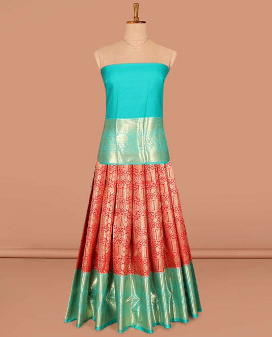 Red Art Silk Pavadai Material Set, Beautifully Bedecked with Jacquard Designs on Its Skirt, Complemented by a Contrast Traditional Zari Design Border, and Paired with a Contrast Blouse
