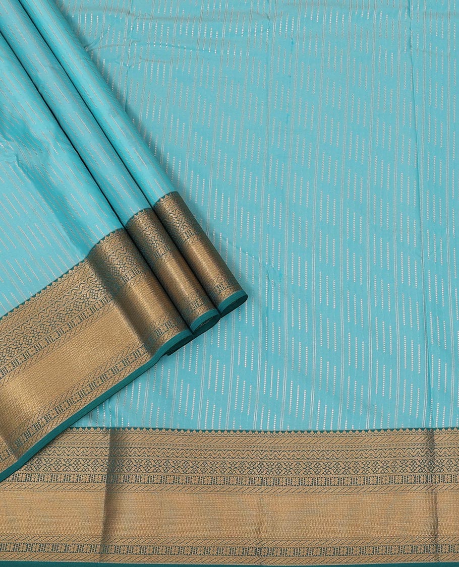 Blue Art Silk Pavadai Material Set, Decked Up with Zari Buttas Skirt, Complemented by a Contrast Traditional Zari Design Border, and Paired with a Contrast Blouse